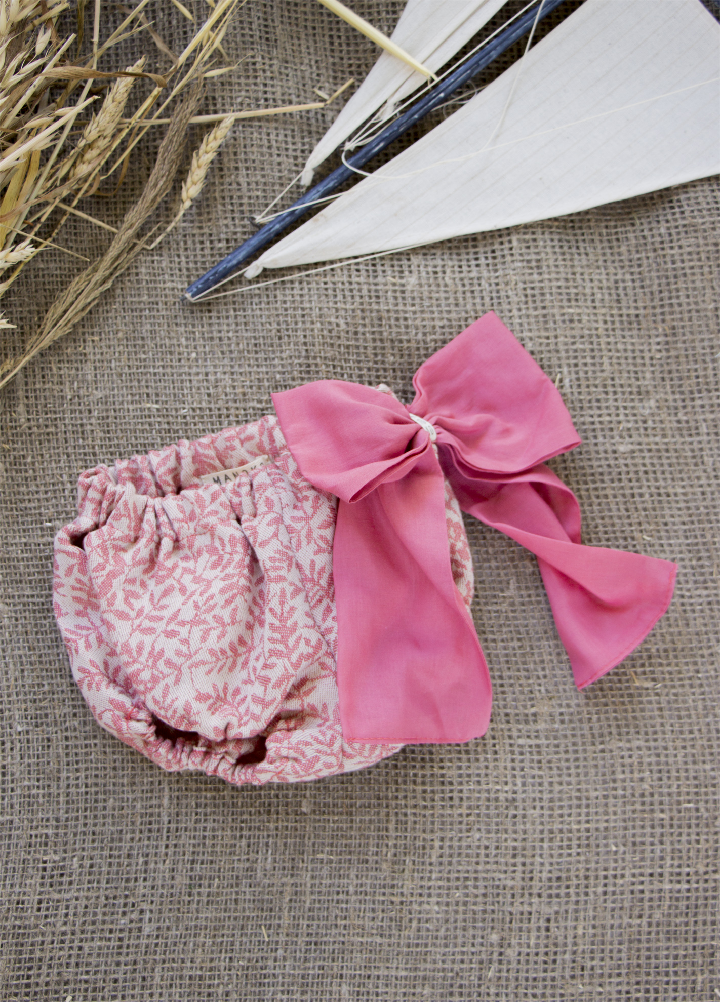 Linen baby diaper cover with a ribbon
